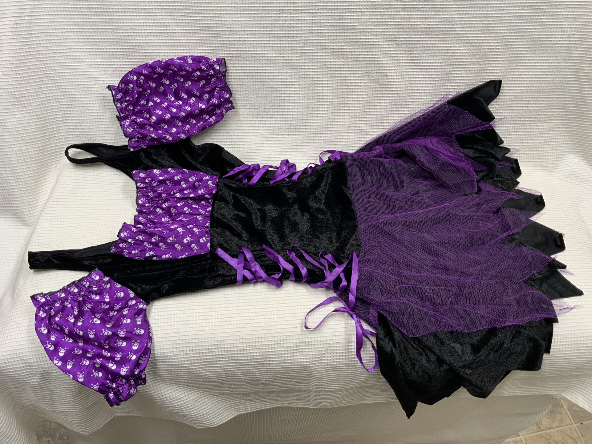 Witch dress is in excellent condition.