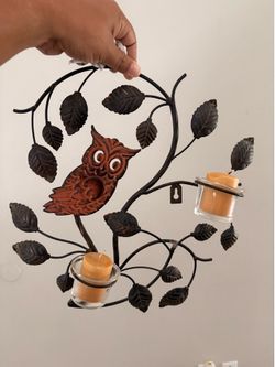 Decoratively owl candle holder
