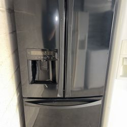 Black Kenmore Refrigerator And Freezer