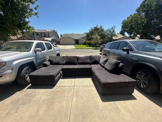 Colby smoke 3 piece sectional couch.
