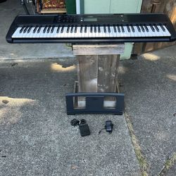 Yamaha PSR-EW320 keyboard, stand, music stand, sustain Pedal and power supply all in good condition, ready to make music.  Has touch sensitive keys an