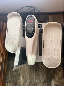 Mini exercise bike, brand new, can use anywhere, plus a stair stepper with extra steps