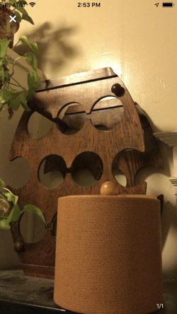 10 bottle wine rack and vintage ice container.