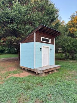 Artisan wood-crafted child’s playhouse