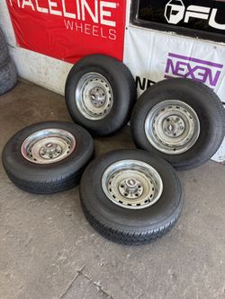 15” GM Rally Wheels With Beauty Rings On 235/75/15 White Wall Tires 