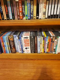 100+ VHS TAPES/100+ DVDs/DVD-VHS PLAYER