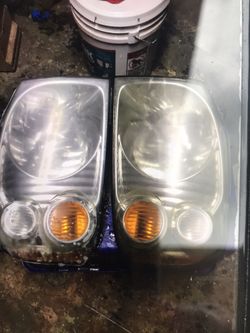Nissan frontier 2003 head lights