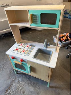 Wooden play kitchen for small children! Item only used indoors.