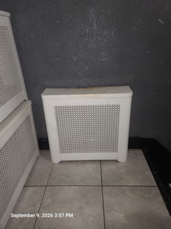 Three (3)  Used RADIATOR COVERS