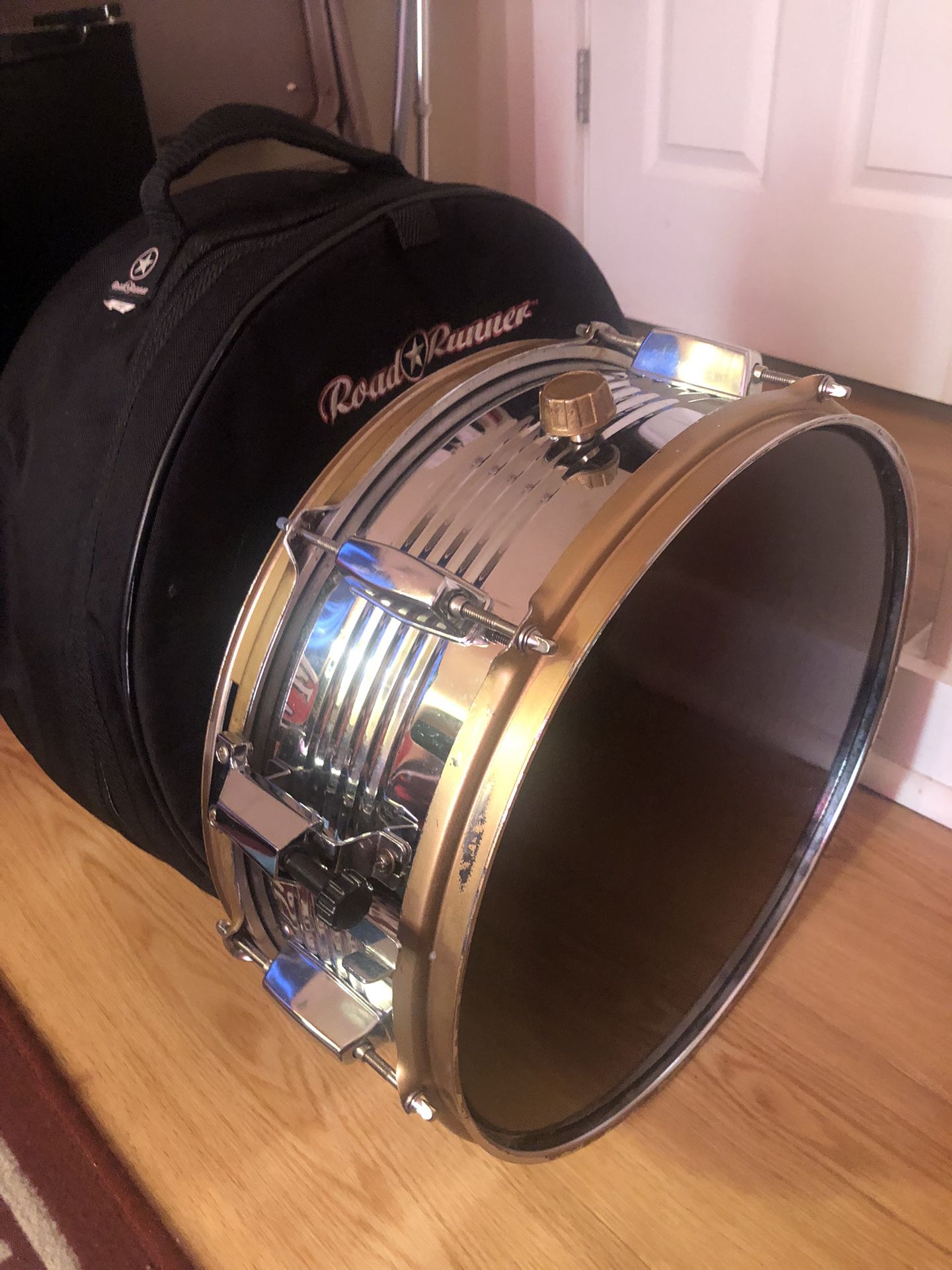 A Used Silver Snare Drum With Case And 2 Drum Keys