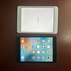 2 iPad mini 2 16GB WiFi only, excellent condition come with the wall plug but no usb 