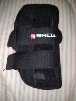 BREG. Wrist And  Hand Adjustable Elastic Wrap  With Thumb Area Great Shape