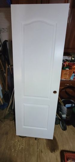 Two - 2 Panel Arch Top Doors