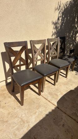 4 chairs some sun damage