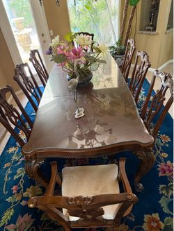 Pulaski furniture dining room table with 8 chairs.