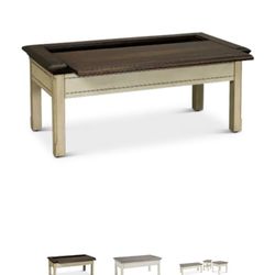 Sutter Creek Cream And Brown Slide-Coffee Table 