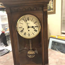 Howard Miller grandfather clock for a mantle