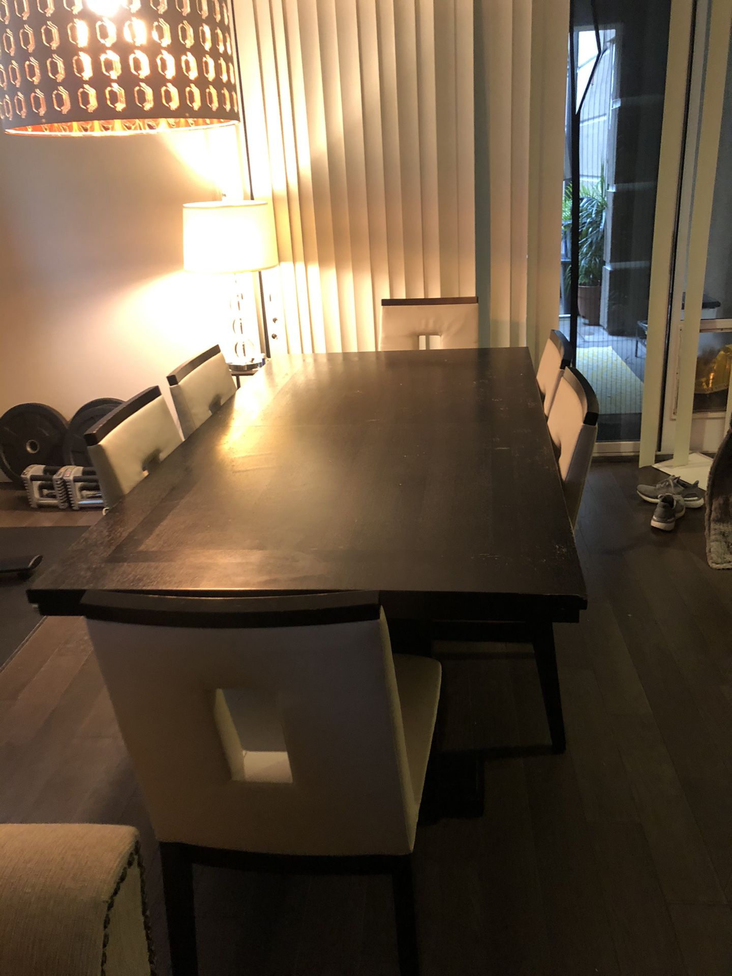 Black Wood Modern Table with 6 chairs (worn) and an extended piece