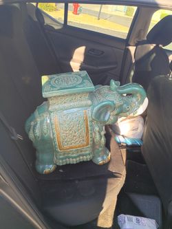 Teal green elephant garden stool