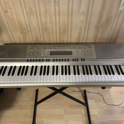 Casio WK-200, 76-Key Touch Sensitive Keyboard.