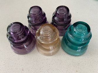 Collection of 5 glass insulators