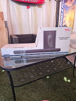 The selected region shows the retail packaging for a TCL Alto 6+ 2.1 Channel Home Theater Sound Bar with Wireless Subwoofer