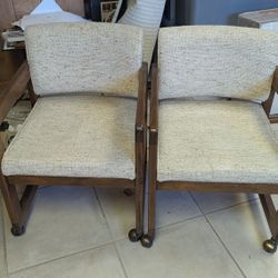 Two Rolling Chairs With Armrest