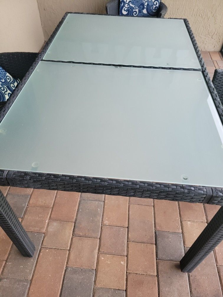 Reduced 59"×36" table glass and Wicker mint condition 1 year old used inside lanai paid $699 plus tax(no chairs)