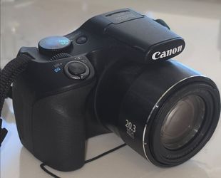 Like-New Canon PowerShot SX540 HS, w/ straps, lens cover & battery.