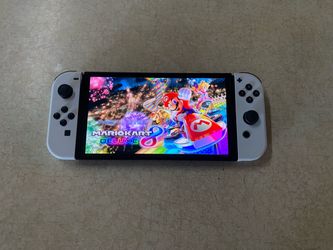 NINTENDO SWITCH OLED with Mario Kart