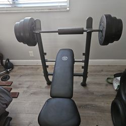 Gold's gym weight bench with weights