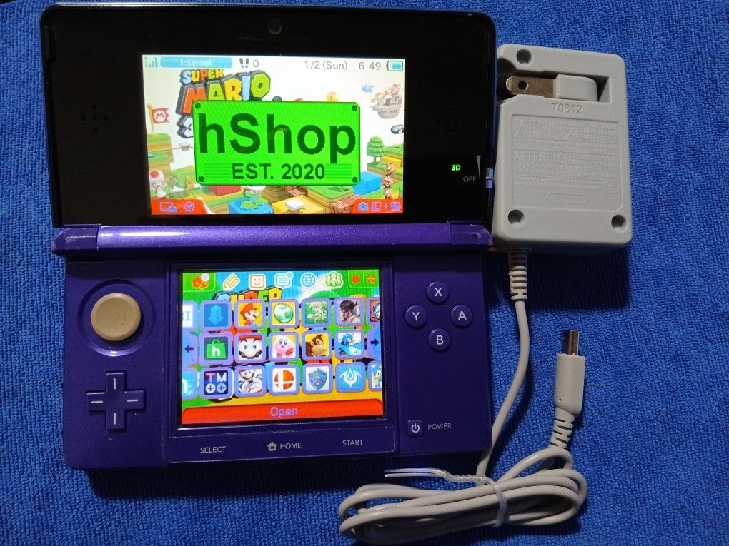 Nintendo 3DS Purple With Charger And Games Inside. Works
