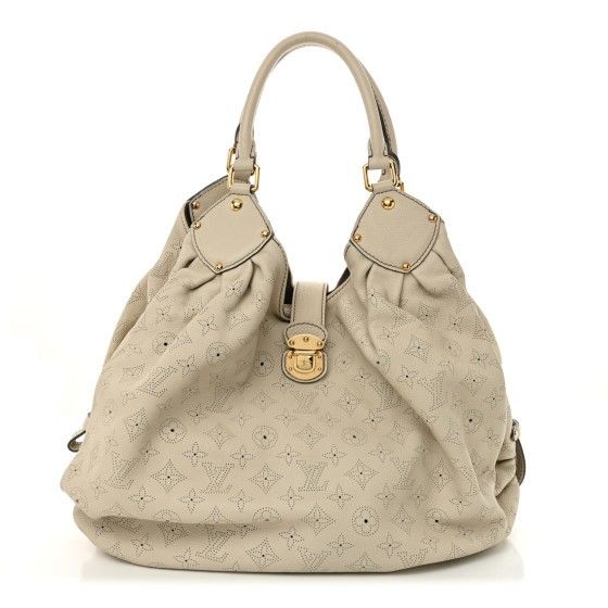 Louis Vuitton 
Mahina XL  Ivory, $1,320.00obo Retails $4,900.00 