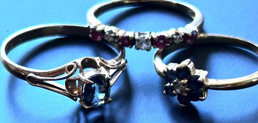 Set of Three Gold Rings with Gemstones 