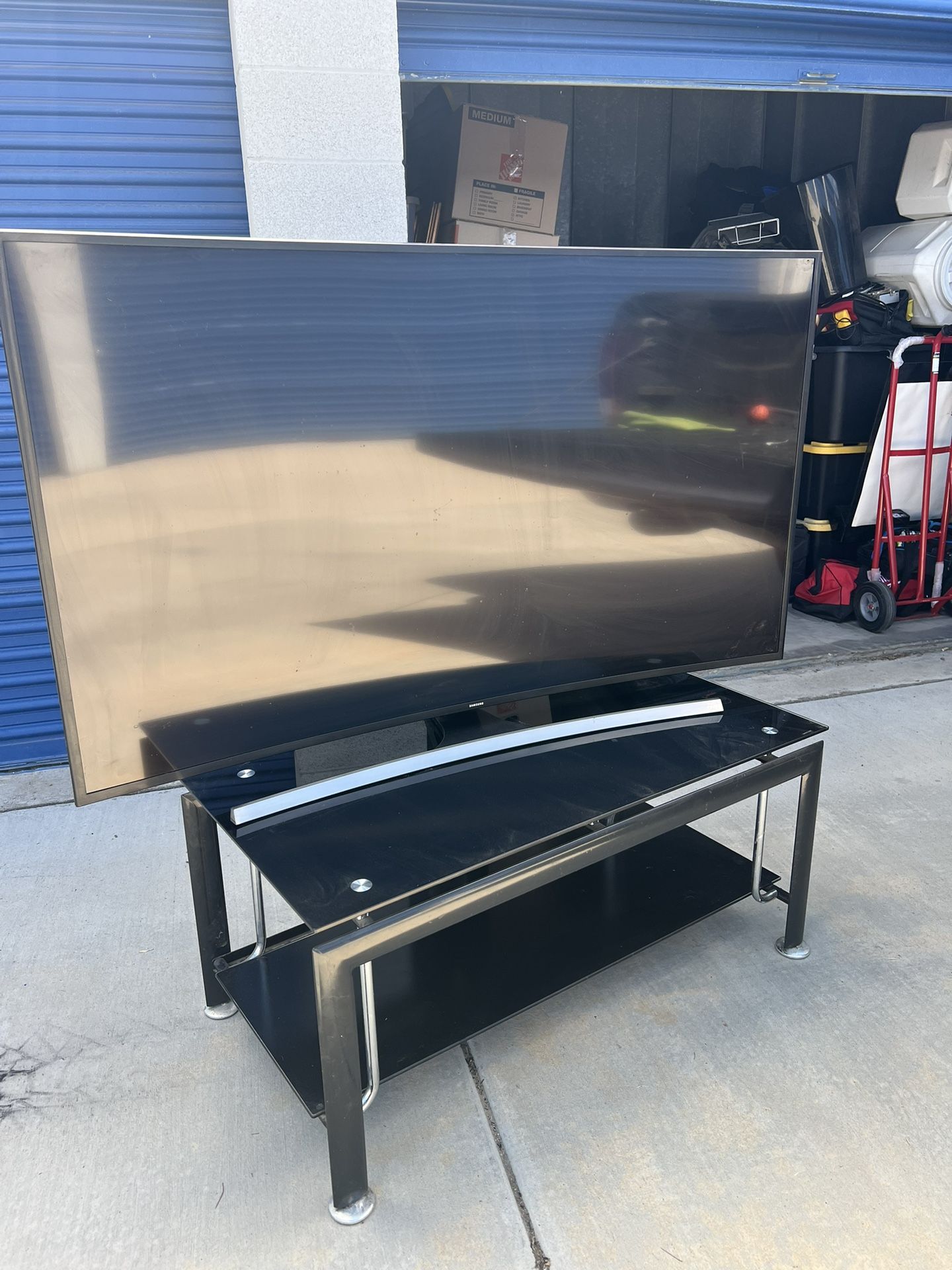 65" Samsung Tv And A Stand
