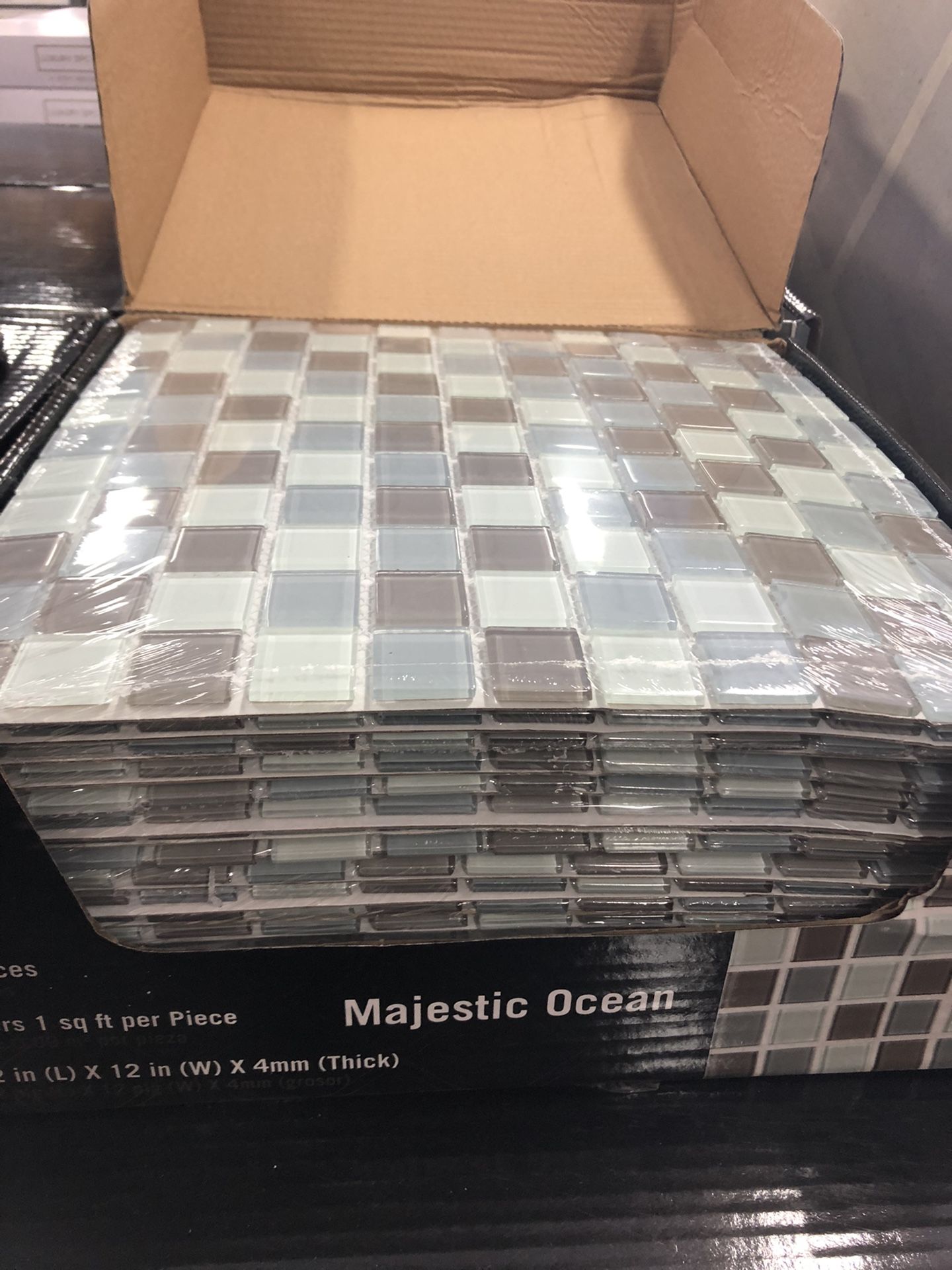 Majestic Ocean 12 in. x 12 in. x 4 mm Glass Mesh-Mounted Mosaic Tiles $4 per sheet.