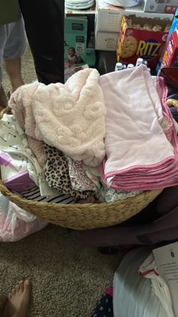 Lots of baby clothes and supply
