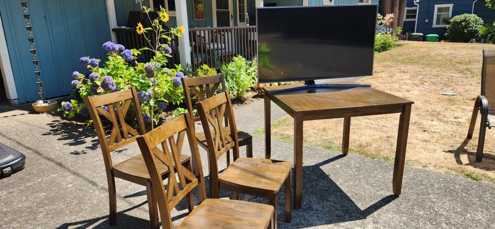 Solid Wood Dining Table - $150