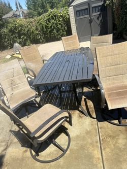 Patio Table & 6 Swivel Chairs 
