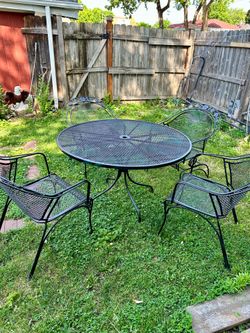 Wought iron patio set, table with 4 chairs