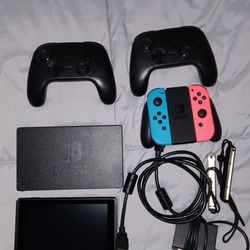 Nintendo Switch. With Games And Extra Controllers 