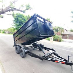 BRAND NEW DUMP TRAILER 12x8x4 12,000 LBS ROLLING TARP AND SPARE TIRE HYDRAULIC SYSTEM ELECTRIC BRAKES TITLE IN HAND FOR ANY QUESTION TEXT ME PLEASE