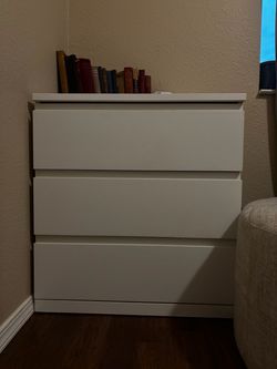 White wooden dresser with 3 drawers