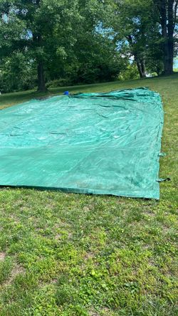 Tarp heavy duty 35 ft x 55 ft used . Has grommets.  a few pinholes