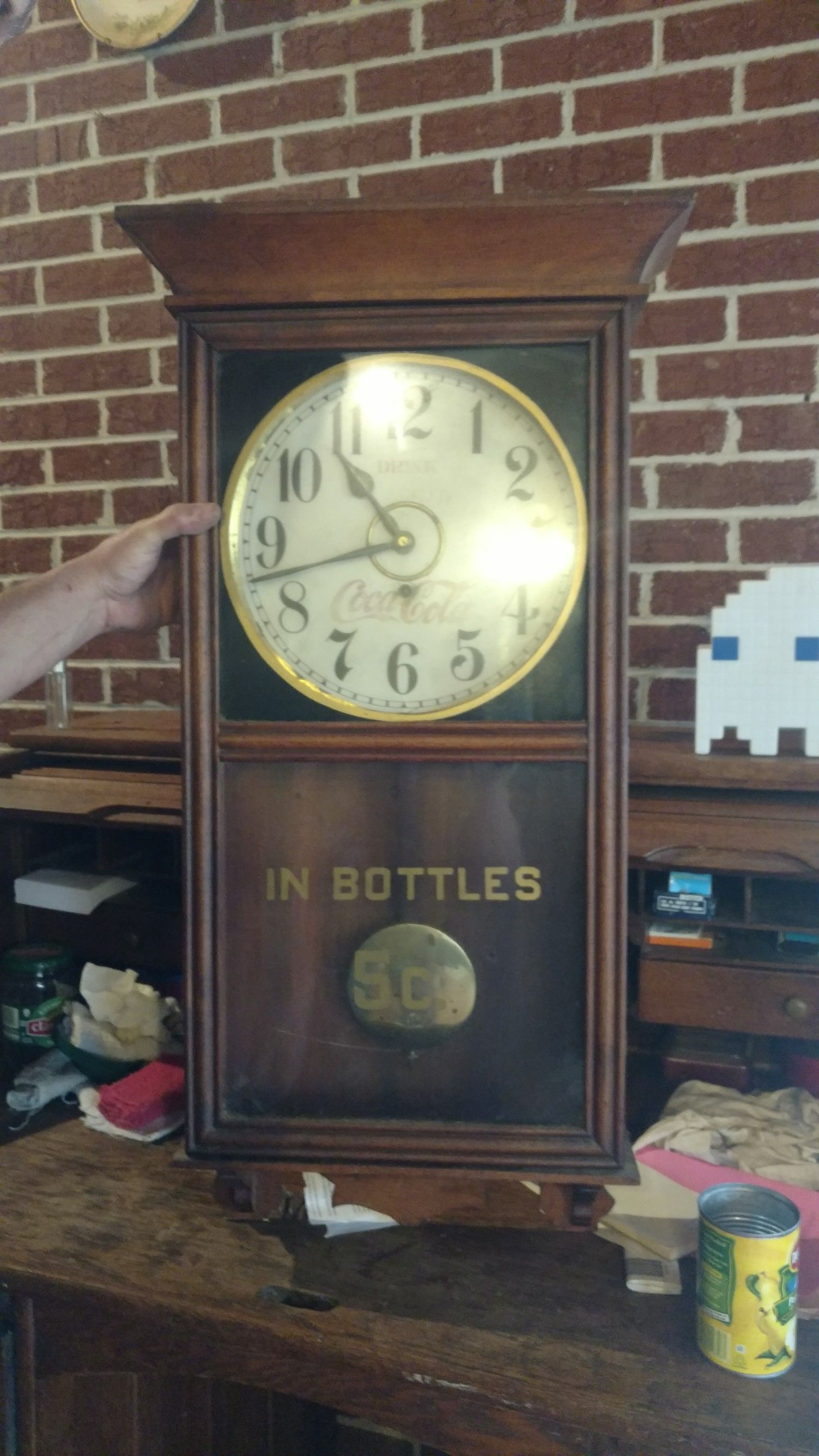 Genuine Antique Coca-Cola Clock has trade mark on it.