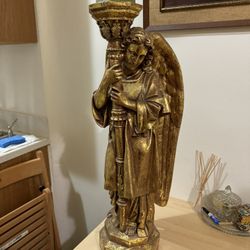Tall gilded angel candle holder