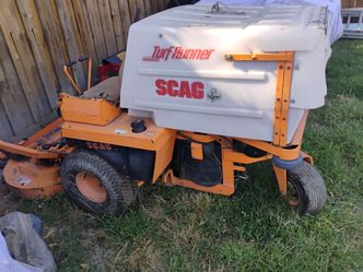 Scag ridding lawnmower 48" deck  Kohler commander motor , 1550 hours works perfect