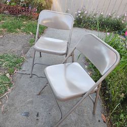 Two metal Grey chairs