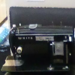 VINTAGE SEWING MACHINE WITH PEDAL MADE BY ,"WHITE"