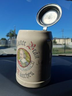 VINTAGE PAULANER B RAU, M UNCHEN LIDDED BEER STEIN IN GREAT CONDITION . THE STEIN HAS A LIGHT GRAZING DUE TO AGE. SUPER RARE!...asking $30.00